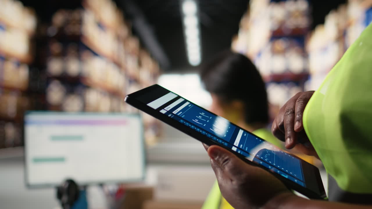 Vertical Video Close up of black woman monitoring e-commerce activity on tablet