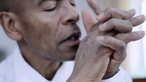 praying to god with hands together on grey background stock video stock footage