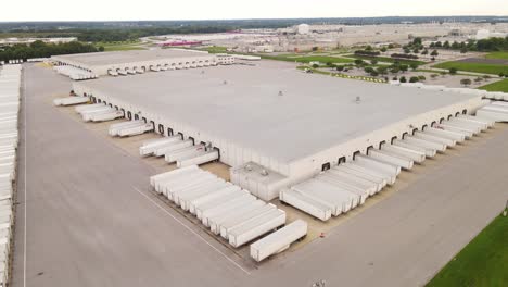 semi truck trailers manufacturing plant in aerial view of usa warehouse