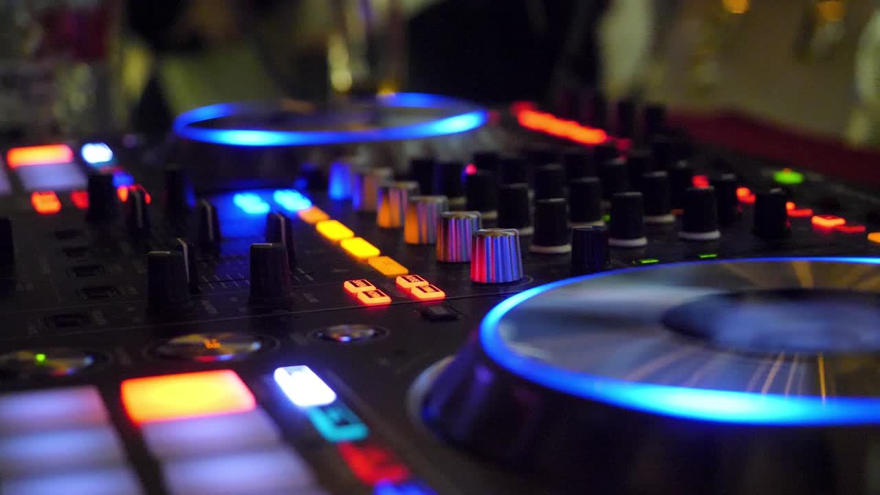 DJ Mixing Music at a Party