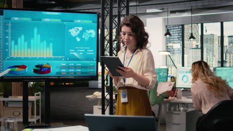 vertical video empowered ceo examining monthly reports data for efficiency
