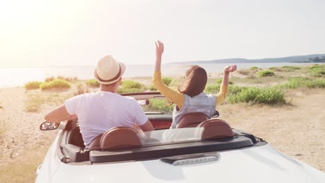 happy couple enjoying a scenic road trip