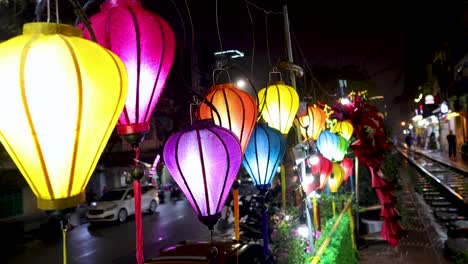 vibrant lanterns light up a bustling street