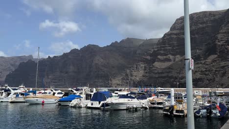 port of los gigantes during the day with calm sea