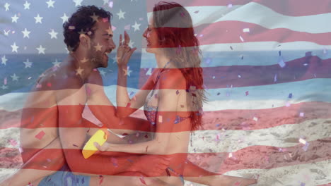 animación de la bandera de los ee.uu. sobre una pareja caucásica en la playa en verano
