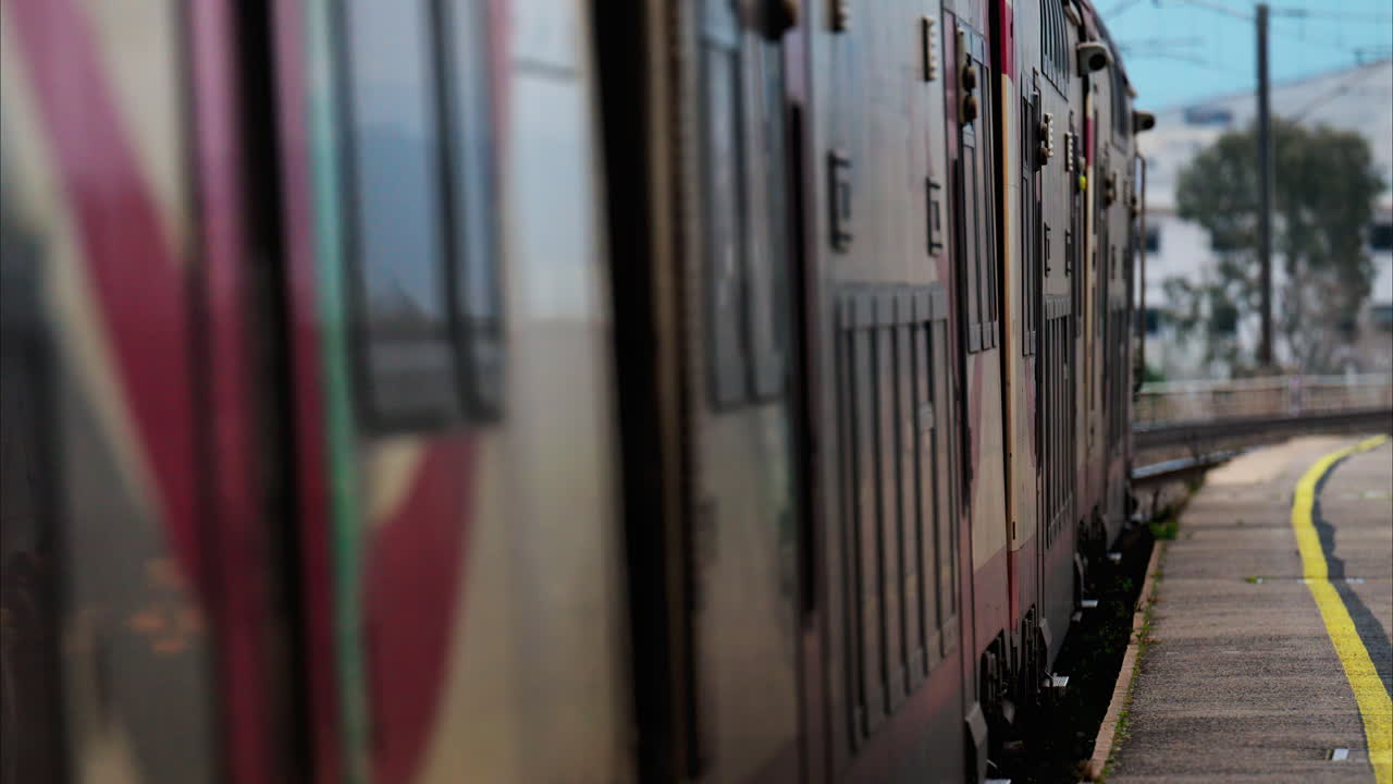 Nice, France - February 4, 2025: Trains moving on the rails in the Nice Ville Central train station