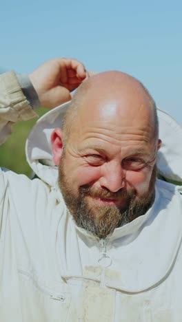 a beekeeper in protective gear