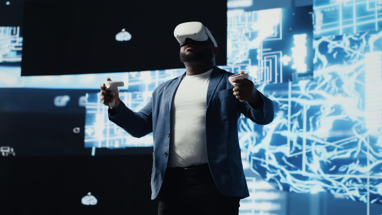 Young african american engineer focused on VR headset programming
