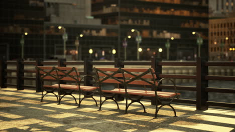 empty benches along a city river