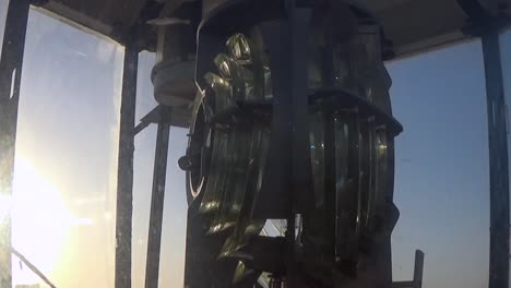 rotating lens of a lighthouse in the red sea