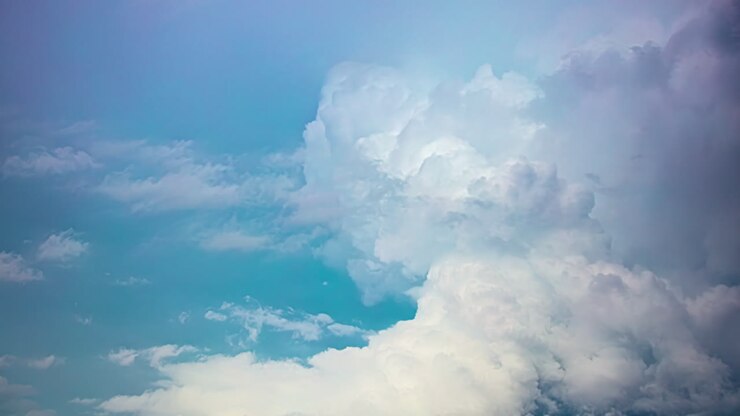 Amazing timelapse of a huge cloud moving and shifting shapes in the blue sky