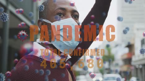 pandemic text with increasing cases against african american man wearing face mask hailing a taxi