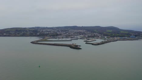 serene dynamic aerial of howth from the sea