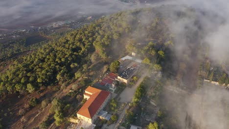 Misty Mountain Landscape with Historical Site