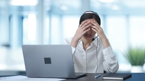 Stressed-and-tensed-Indian-call-center-girl-talking-to-the-customer