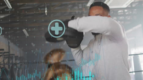 boxing in gym with health data and medical cross animation over video