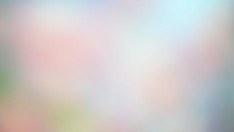 soft pastel blurred background with pink, blue, and white hues
