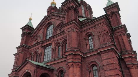 uspenski orthodox cathedral in helsinki, dolly out, shot from the ground looking up during an overcast day