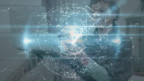 animation of globe with network of connections over woman using laptop