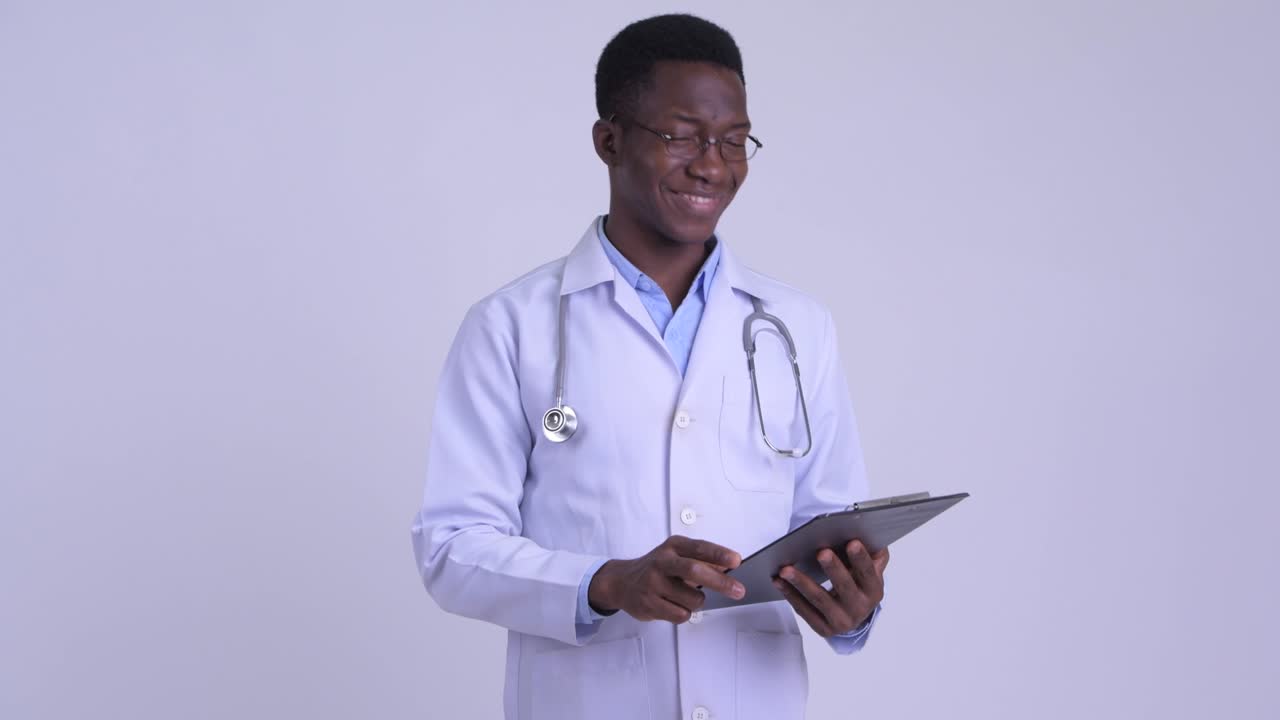 Young handsome African man doctor
