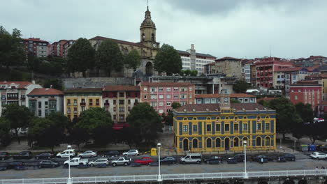 colorful european town with river and bridge
