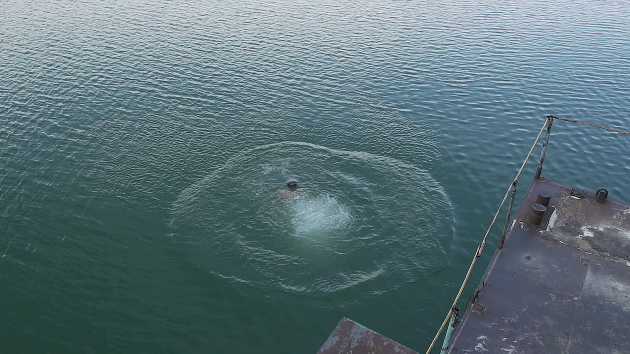 Person diving into the water