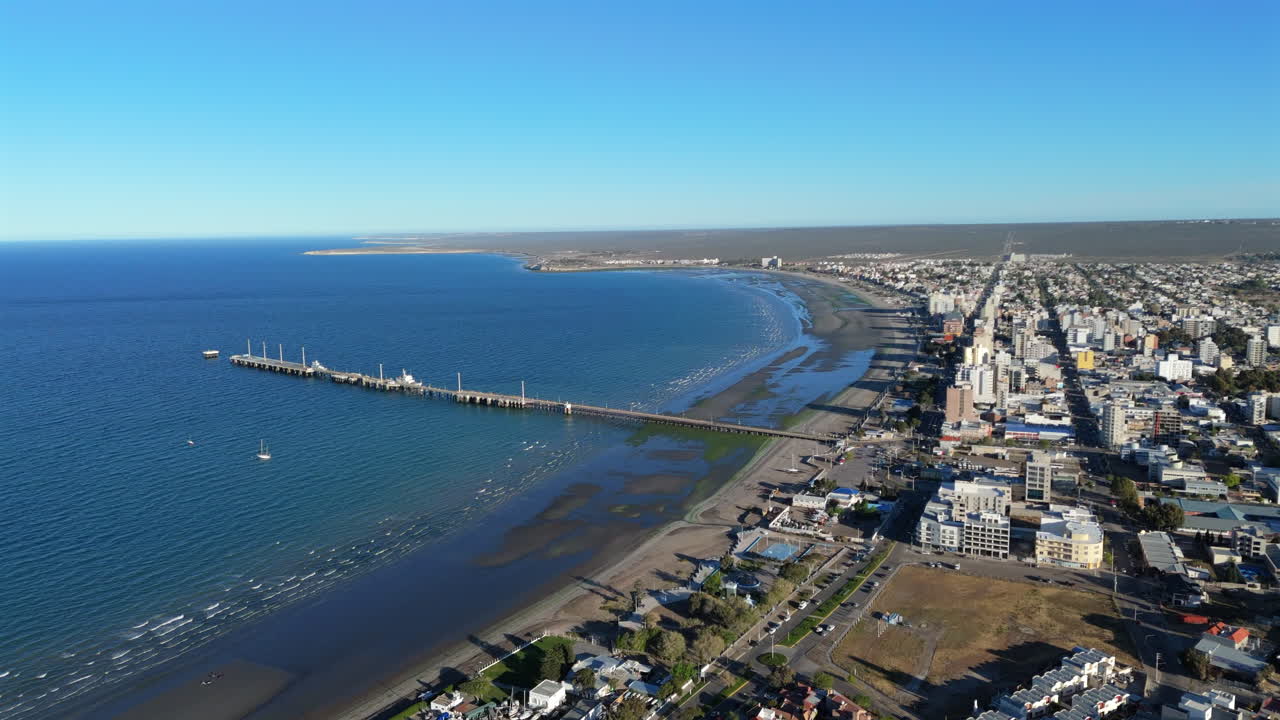 Puerto madryn beach with muelle comandante luis piedra buena pier, aerial view