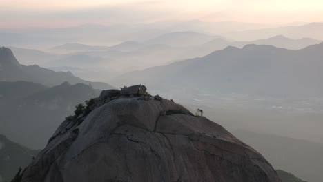 golden hour sunrise shot of bukhansan mountain summit in south korea