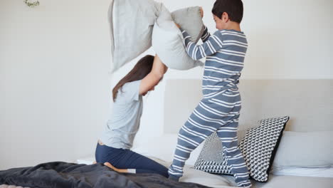 happy, children and pillow for fight in bedroom