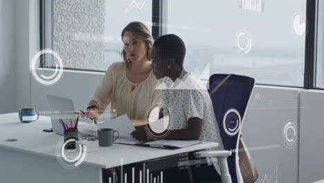animation of icons and data processing over diverse business people in office