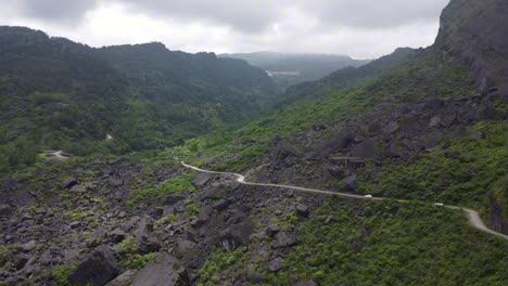 A-car-is-driving-in-a-landslide-area