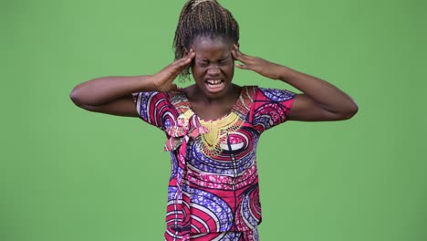 young african woman having headache