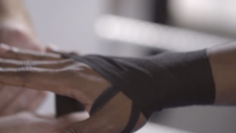 boxer getting hands wrapped in slow mo