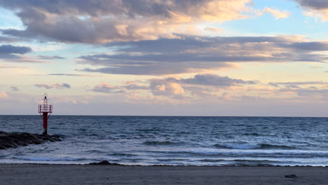 Marbella-beach-on-a-windy-cloudy-day-in-Spain,-sea-view,-4K-shot