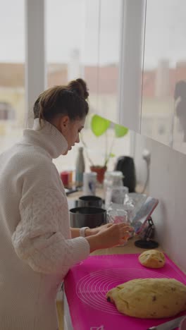 woman baking bread in a kitchen