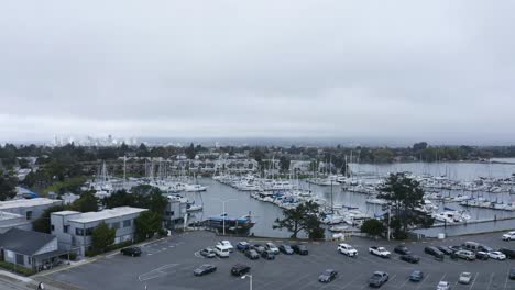 A-large-marina-with-many-sail-boats-on-a-cloudy-day