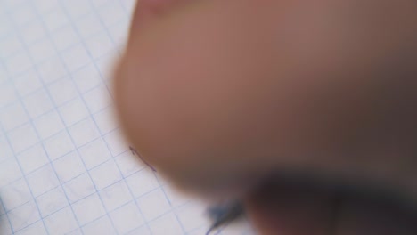 man writes question are you sure with pen on blank paper