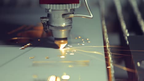 CNC-Laser-cutting-of-metal,-modern-industrial-technology.