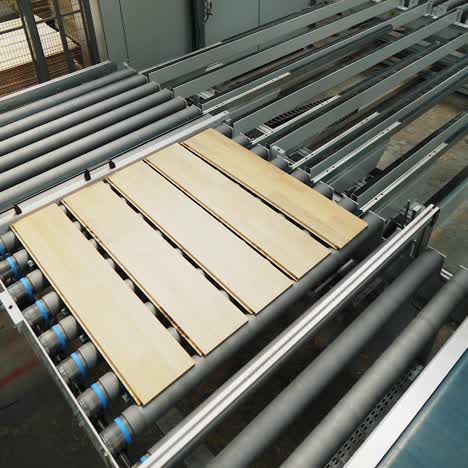 industrial equipment for the production of laminate. several stages of floor production.