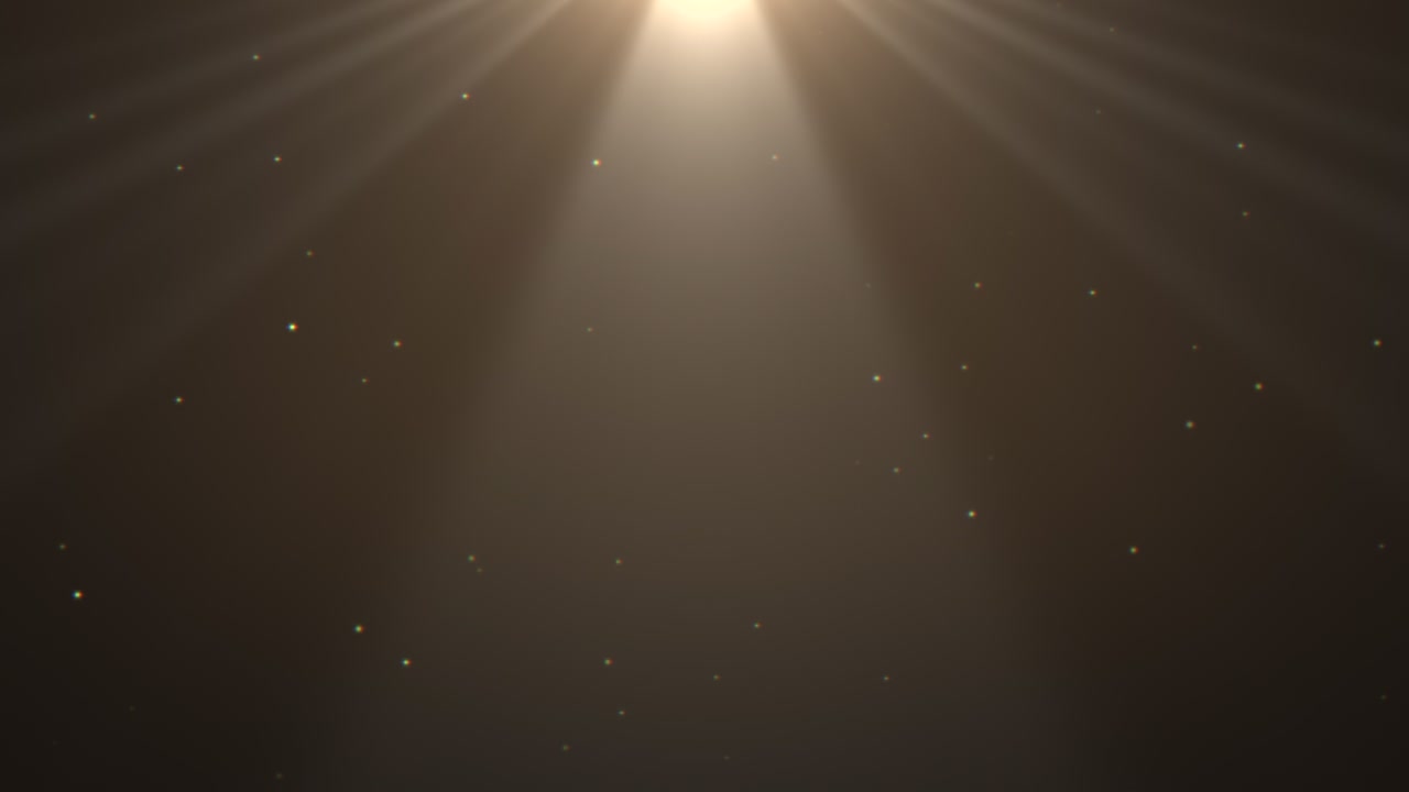 Sun rays and falling gold glitters and confetti on fashion background