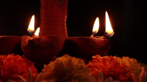 Close-up-video-of-a-beautifully-lit-lamp-glowing-in-the-dark