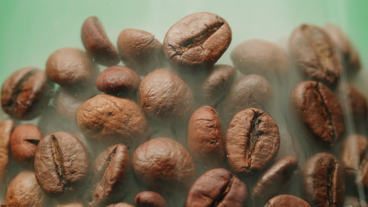 Close Up of Roasted Coffee Beans with Rising Steam