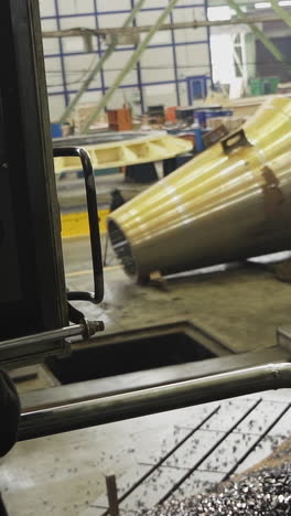large conical structure in an industrial manufacturing facility