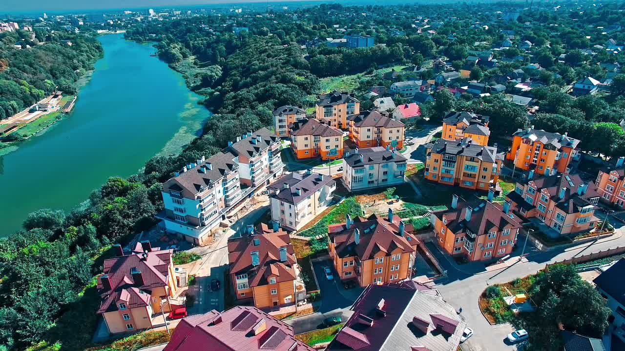 Cityscape View From Above. Aerial shot of the houses and streets of small city at day