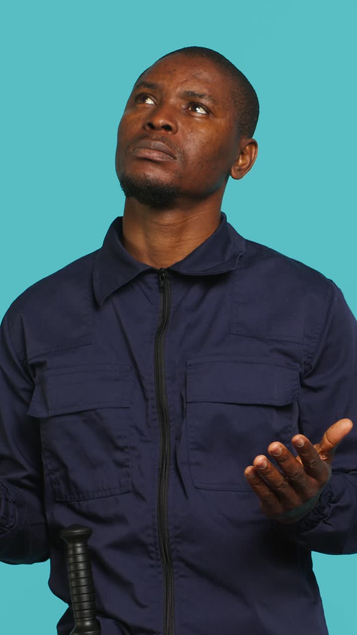 African American Man Looking Up with Open Hands