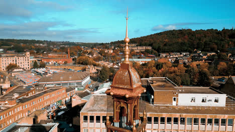 Aerial-drone-footage-of-the-English-market-town-centre-of-Dewsbury-in-West-Yorkshire-in-the-UK-showing-the-historical-town-centre-and-the-Dewsbury-townhall