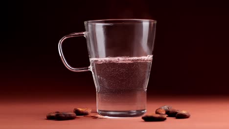 Close-Up-Shot-Of-Hot-Boiled-Water-In-Transparent-Glass-With-Handle