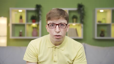 Close-up-portrait-of-young-man-with-thoughts.