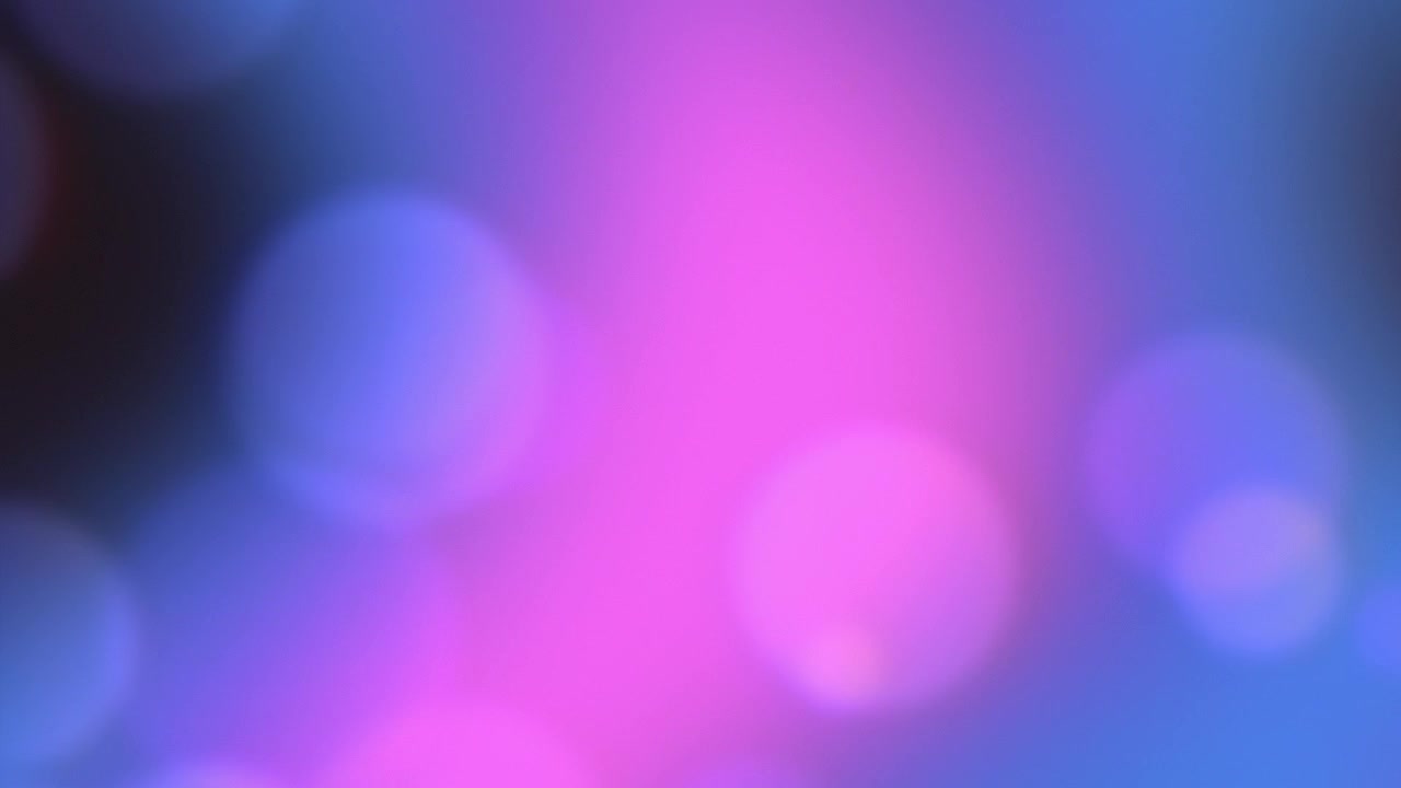Abstract Background with Soft Glowing Blue and Purple Bokeh Lights