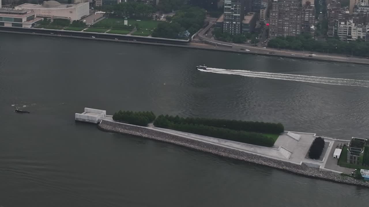 Drone view of New York City waterfront and green park area